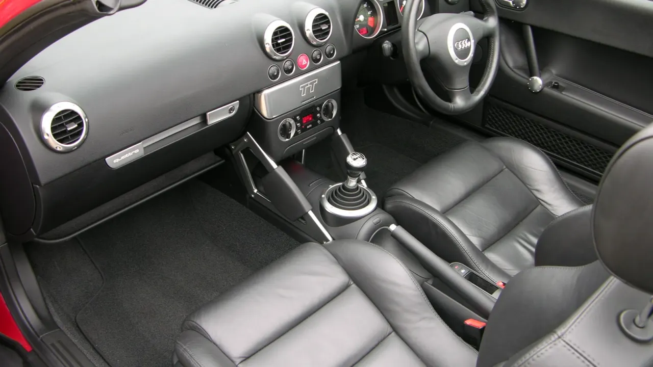 The leather interior and dashboard of an Audi TT