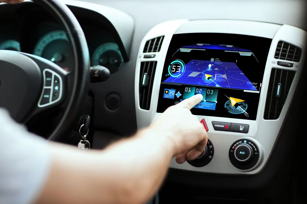 Man pressing car computer