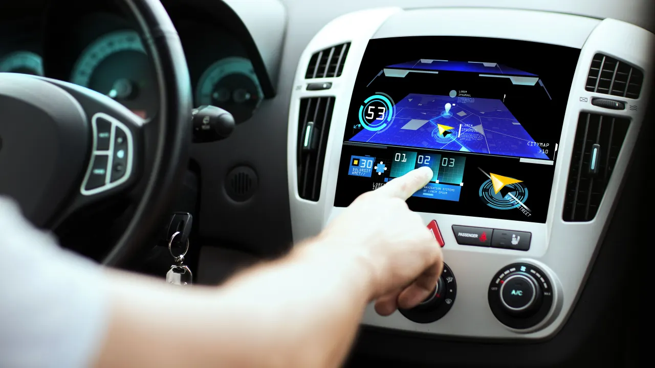 Man pressing car computer