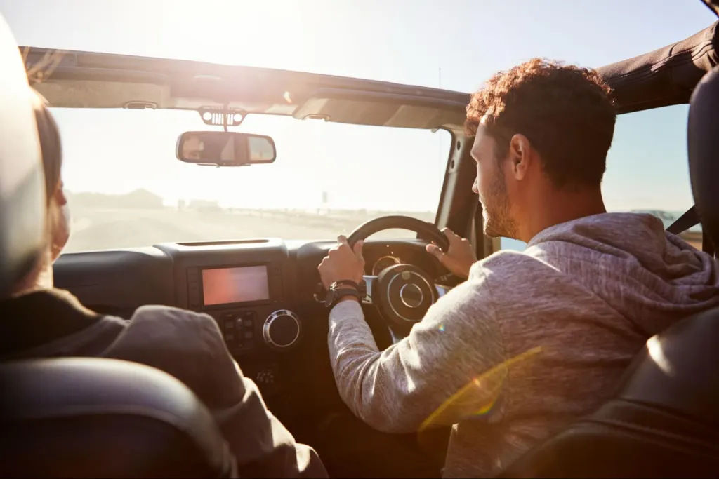 people in jeep with code po113
