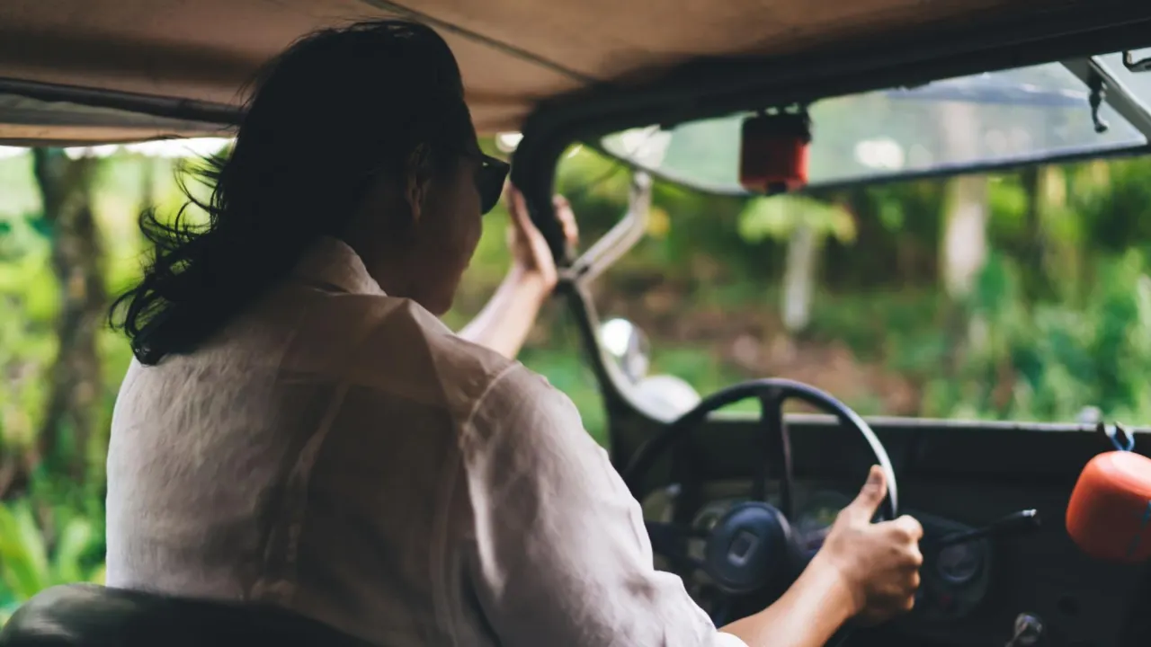 woman in jeep fixing po113 code