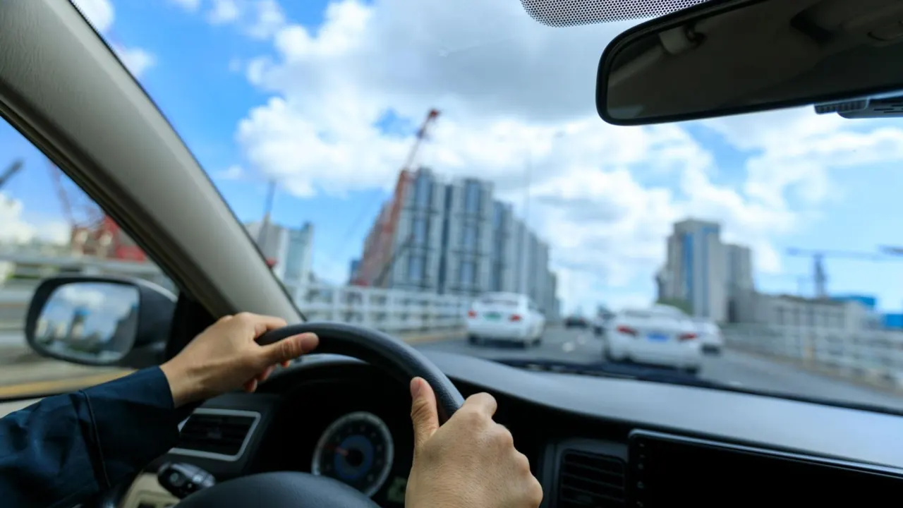 person driving in Miami when the car's TCM loses communication.